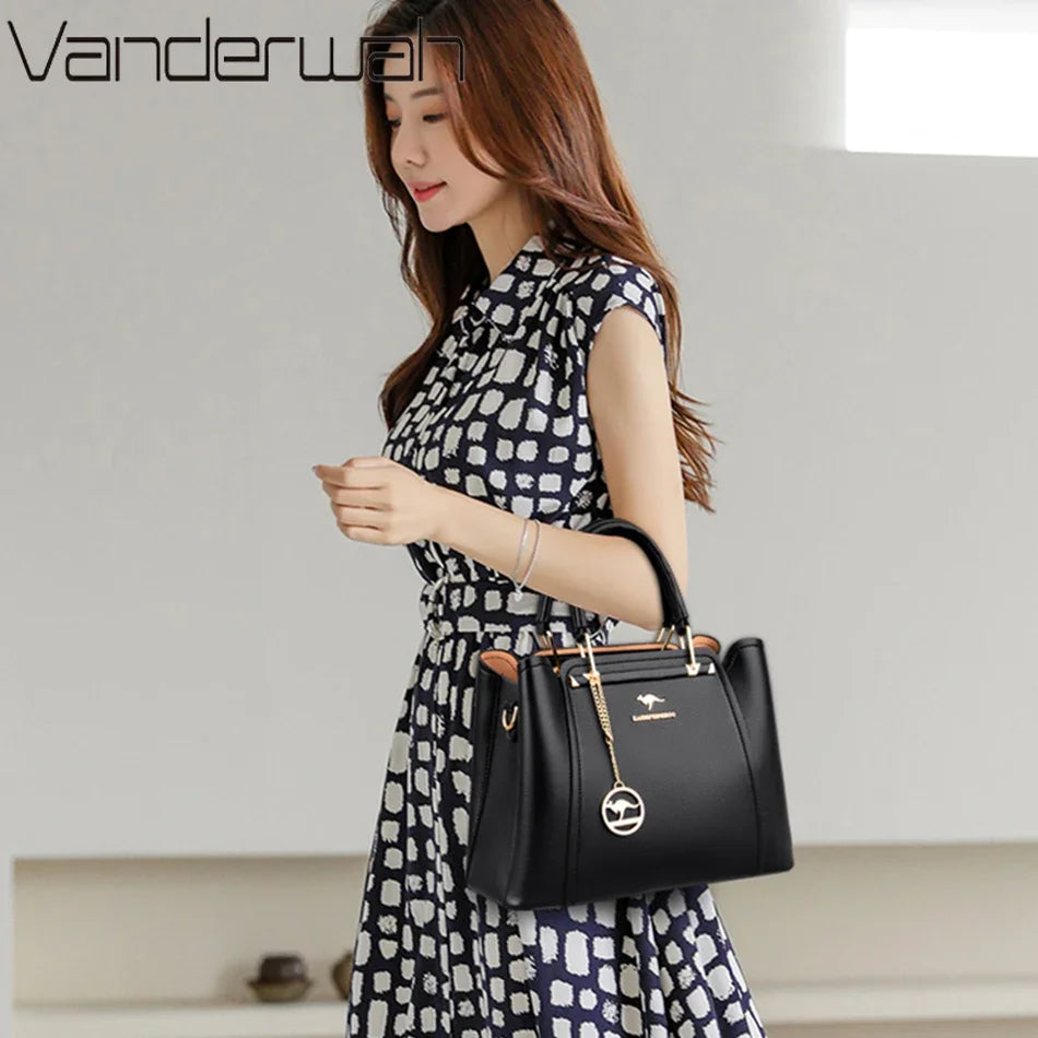 Elegant Black Structured Handbag – Gold Accent Tote by Vanderwah
